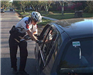 bike officer speaks to vehiclist