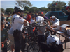 Officers repair bikes with citizens