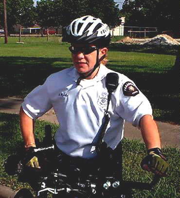 officer with bike close up